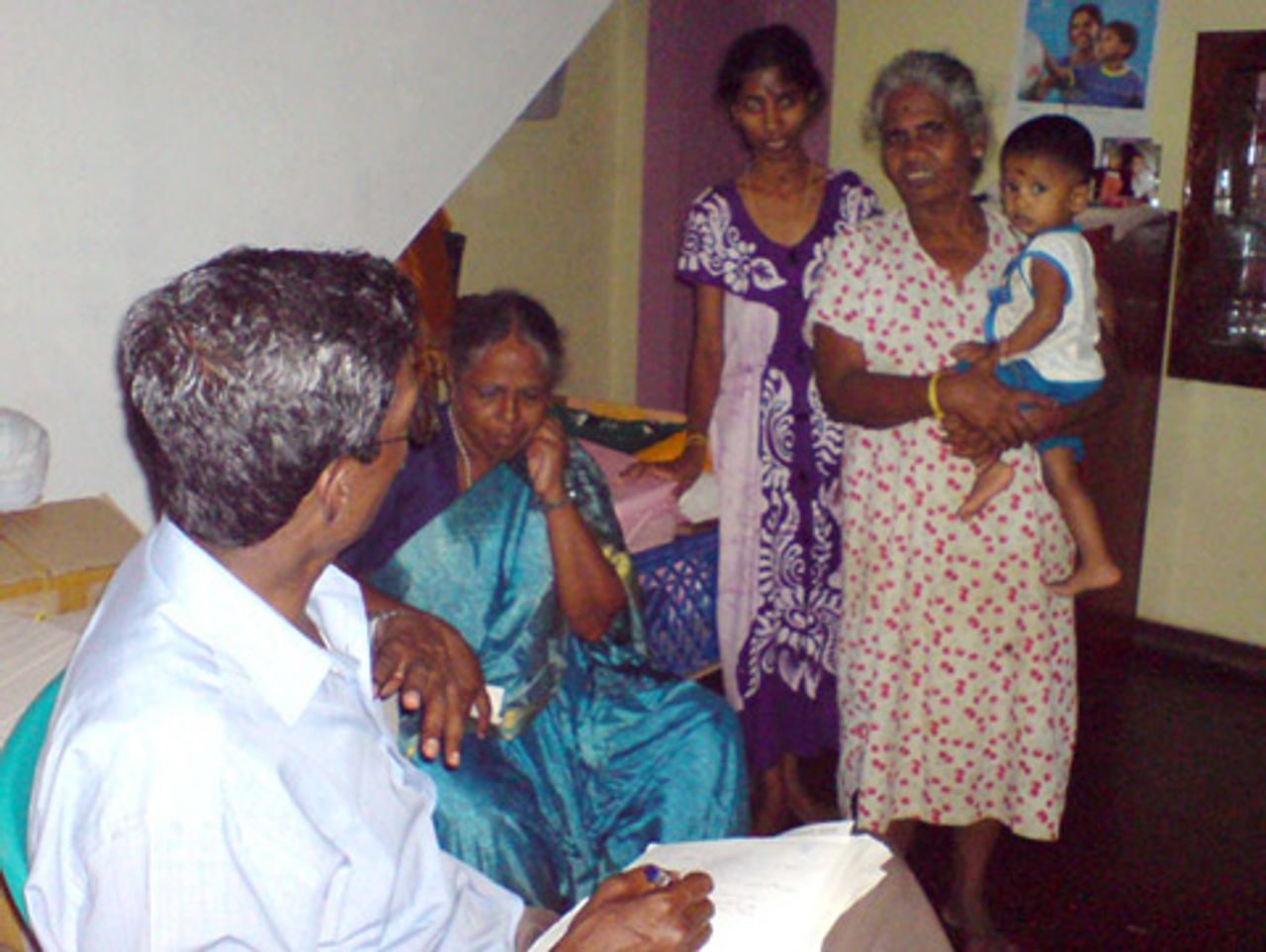 SEP campaigner speaking with Tamil family SEP campaigner speaking with Tamil family