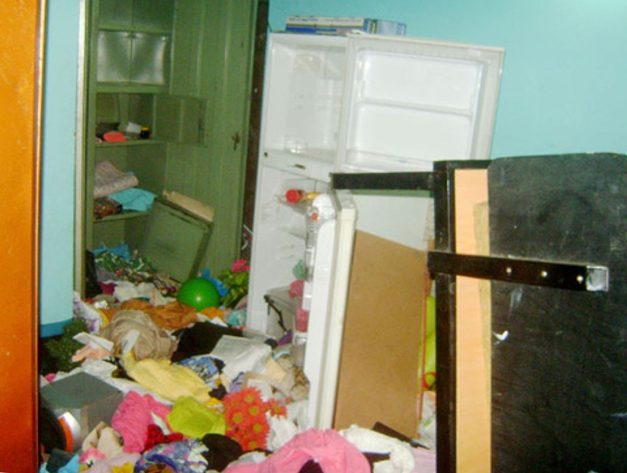 Home trashed in police raid Home trashed in police raid