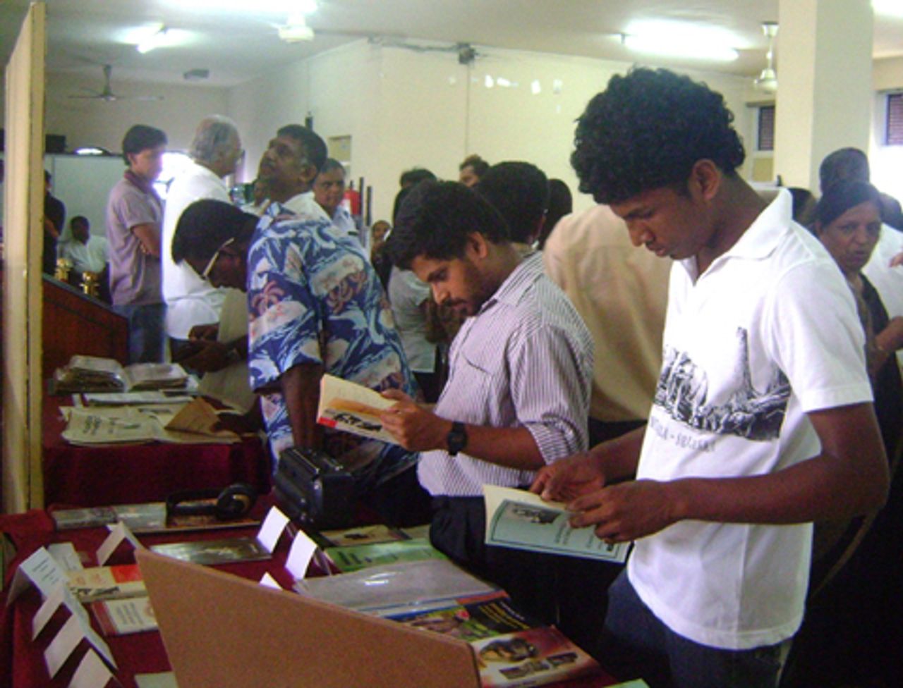 Mourners studying Piyaseeli's literature Mourners studying Piyaseeli's literature