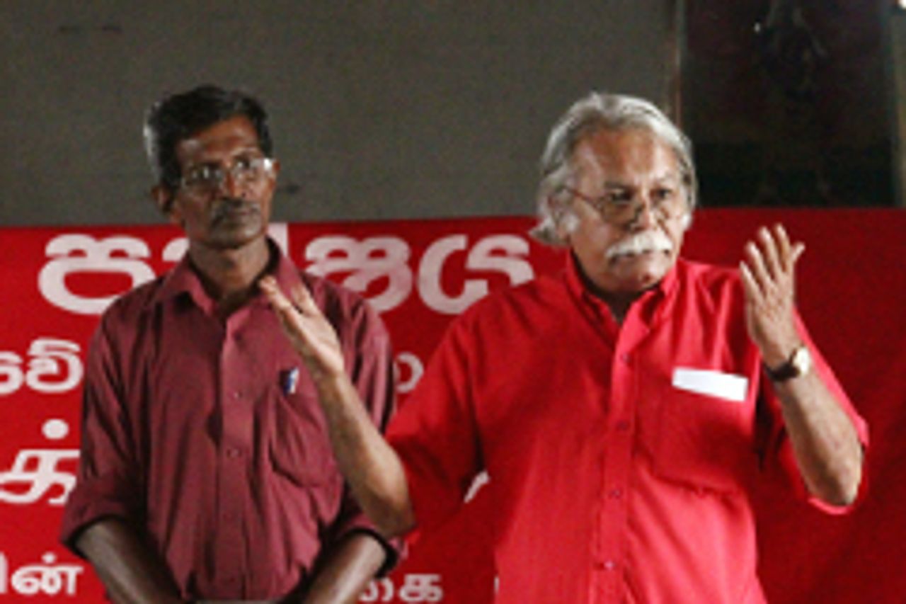 Wije Dias speaking with M. Thevarajah translating Wije Dias speaking with M. Thevarajah translating